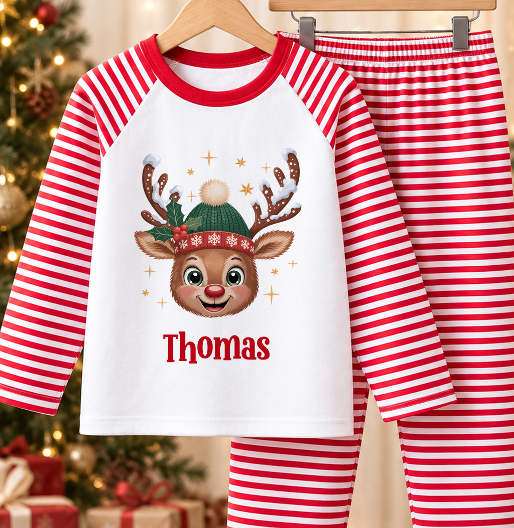 Personalised red and white striped kids Christmas pyjamas with Winter Hat Reindeer design and a custom name printed on the front