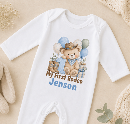 Personalised My First Rodeo first birthday sleepsuit with the name Jenson