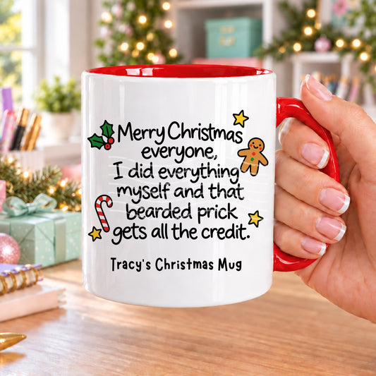 Red handled personalised funny Christmas mug printed with “Merry Christmas everyone, I did everything myself and that bearded prick gets all the credit.” with holly, a gingerbread man, candy cane and stars, and the line “Tracy’s Christmas Mug” underneath