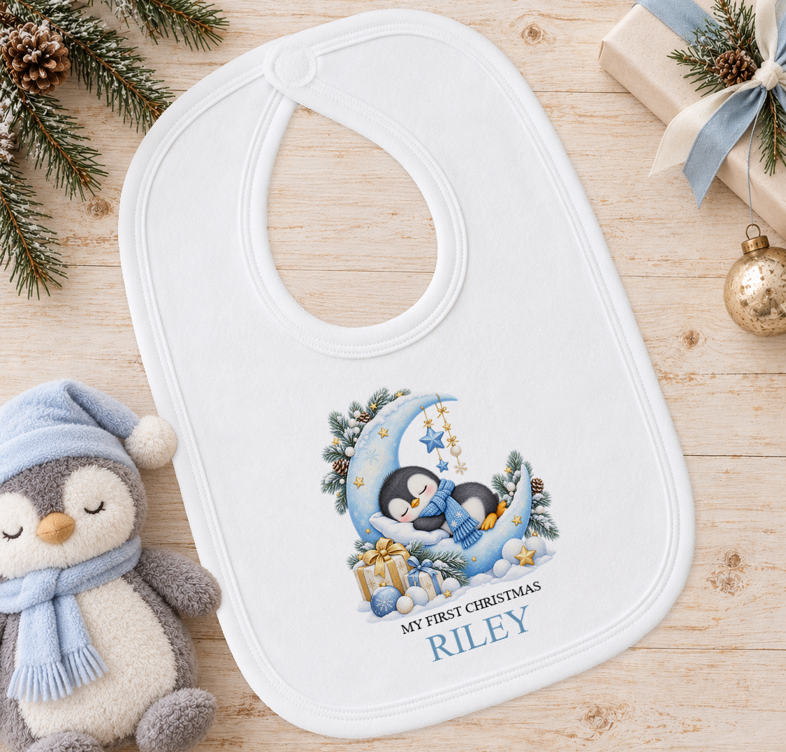 Personalised Sleepy Penguin Moon baby Christmas bib with a custom name