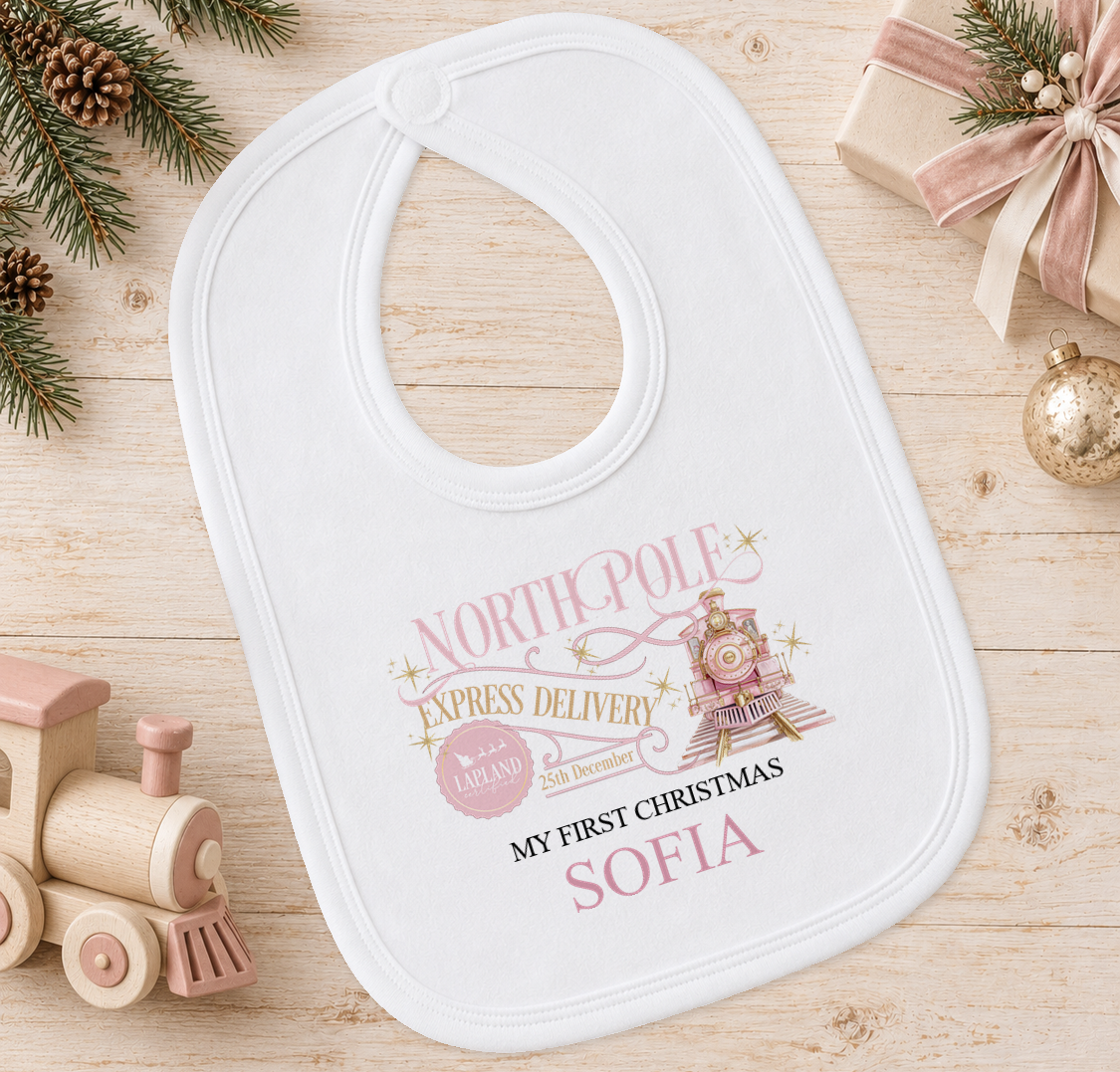 Personalised North Pole Express Pink Train baby Christmas bib with a custom name