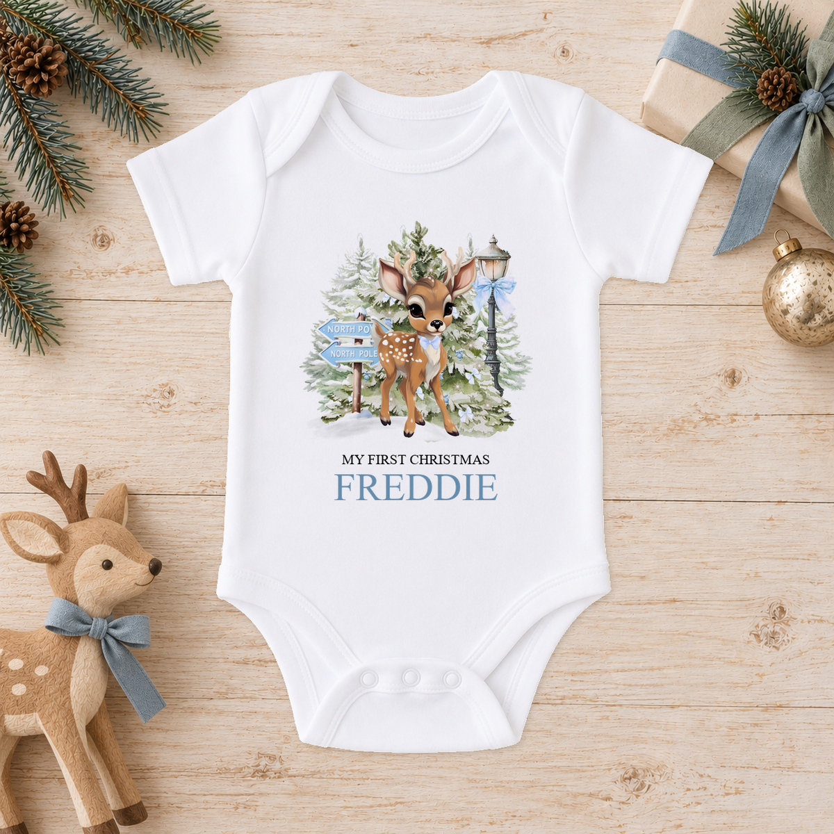 Personalised North Pole Fawn Blue Bow baby Christmas vest with a custom name