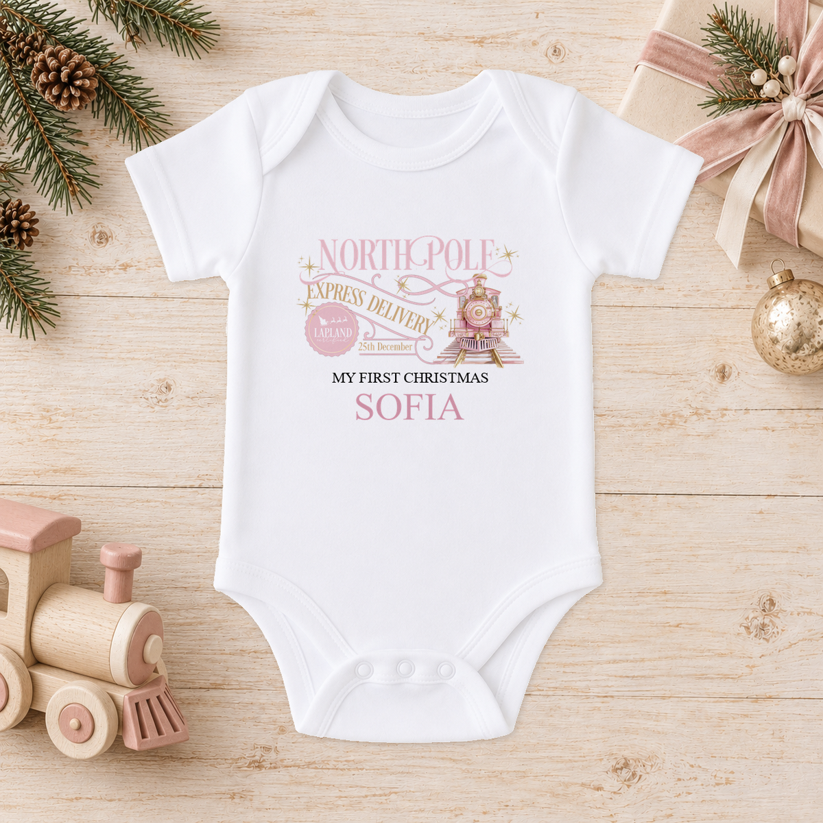 Personalised North Pole Express Pink Train baby Christmas vest with a custom name