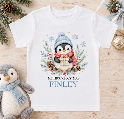Personalised Penguin with Present baby Christmas t-shirt with a custom name