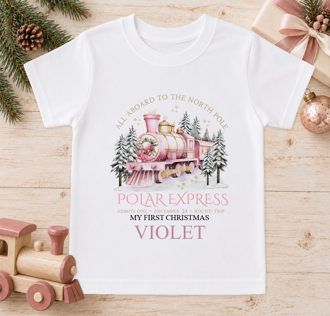 Personalised All Aboard North Pole Train Pink baby Christmas t-shirt with a custom name