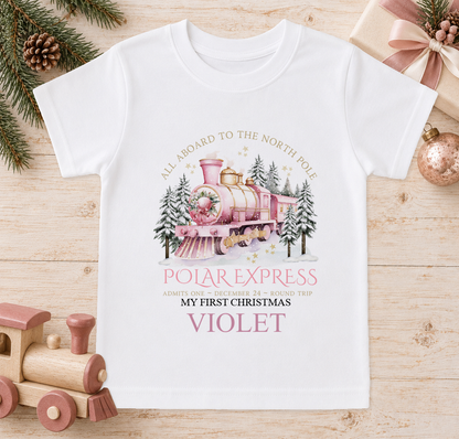 Personalised All Aboard North Pole Train Pink baby Christmas t-shirt with a custom name
