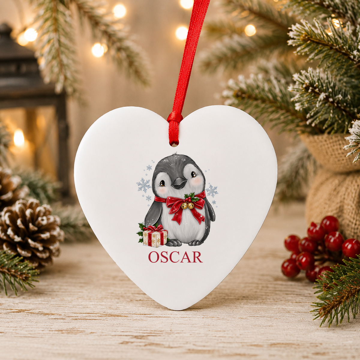 Personalised Jingle Bell Penguin Christmas heart decoration with a custom name