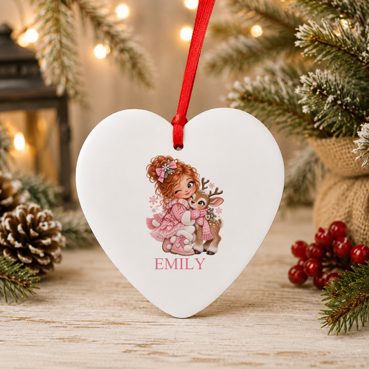 Personalised Girl Hugging Reindeer Christmas heart decoration with a custom name