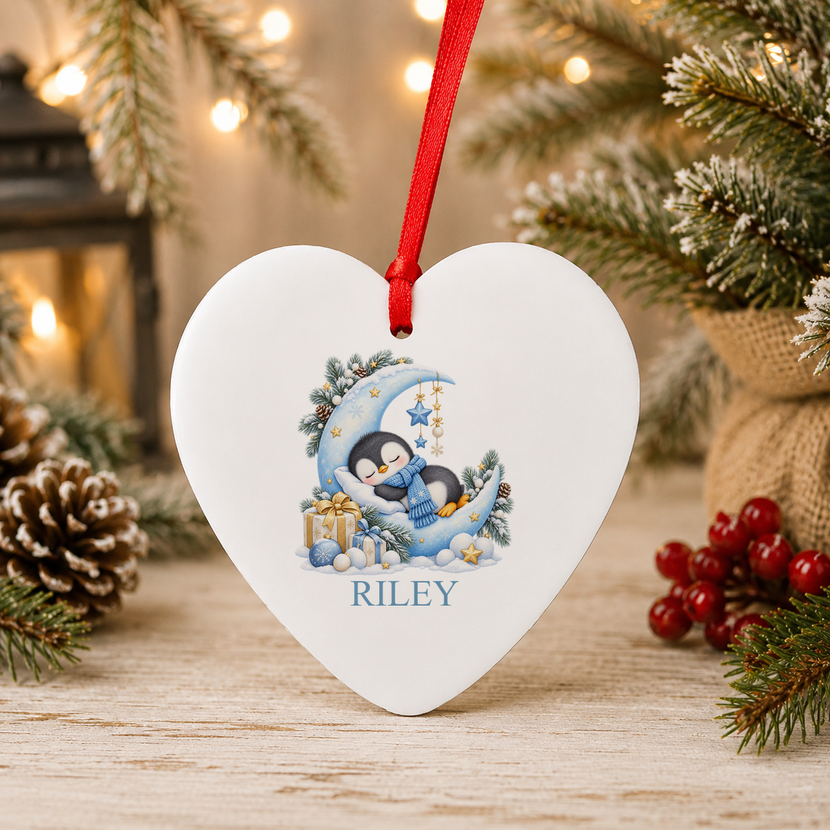Personalised Sleepy Penguin Moon Christmas heart decoration with a custom name