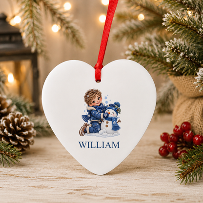 Personalised Boy Building Snowman Christmas heart decoration with a custom name