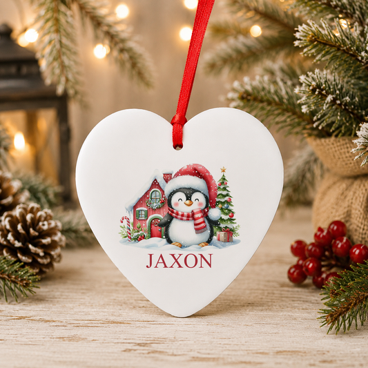 Personalised Santa Hat Penguin Christmas heart decoration with a custom name