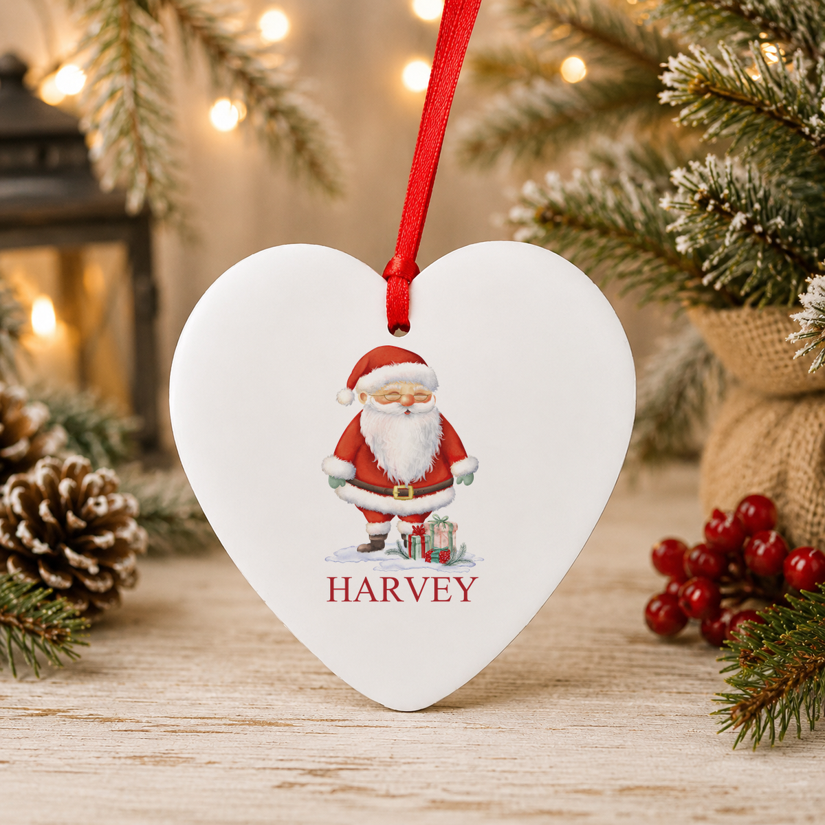 Personalised Santa with Gifts Christmas heart decoration with a custom name
