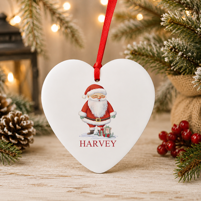 Personalised Santa with Gifts Christmas heart decoration with a custom name