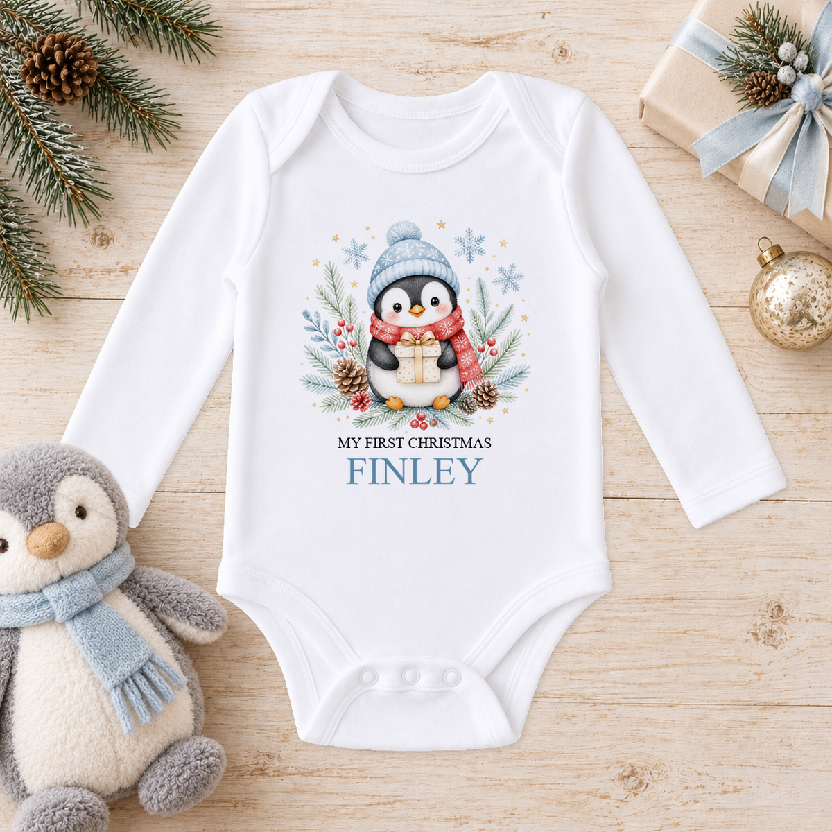 Personalised Penguin with Present baby long sleeve vest with a custom name