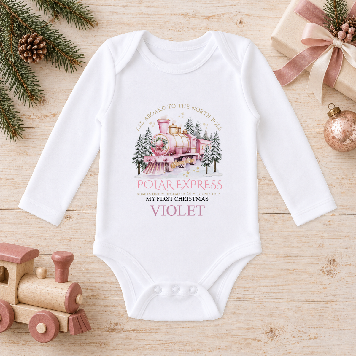 Personalised All Aboard North Pole Train Pink baby long sleeve vest with a custom name