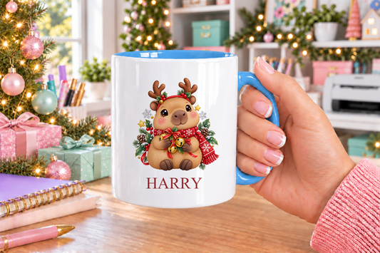 Personalised Capybara Reindeer Christmas mug – blue handle with a custom name