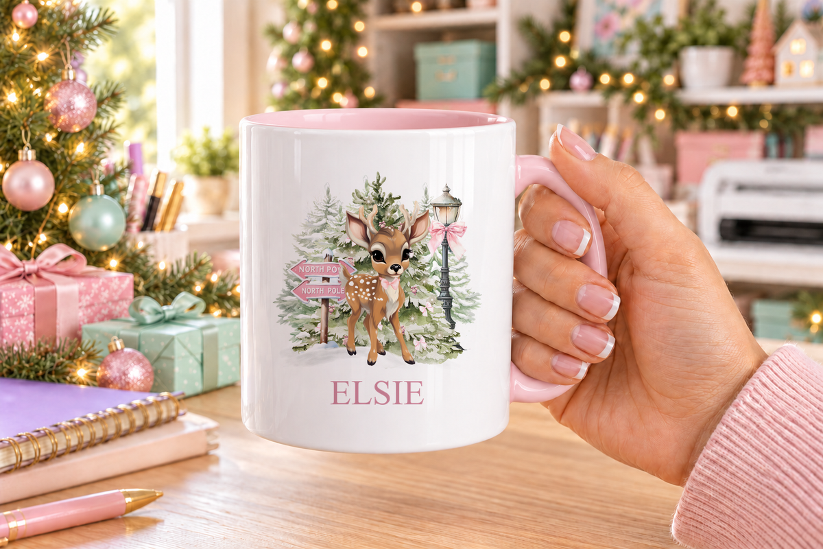 Personalised North Pole Fawn Pink Bow Christmas mug – pink handle with a custom name
