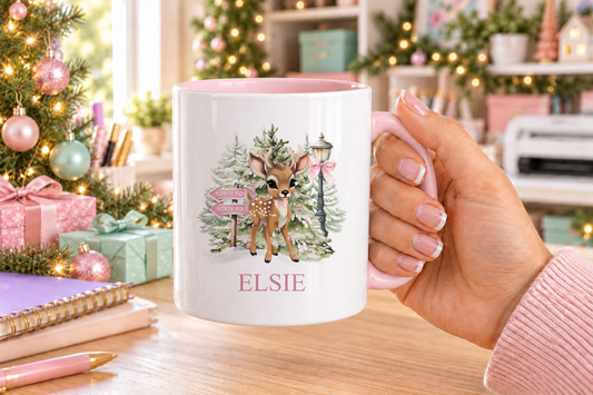 Personalised North Pole Fawn Pink Bow Christmas mug – pink handle with a custom name