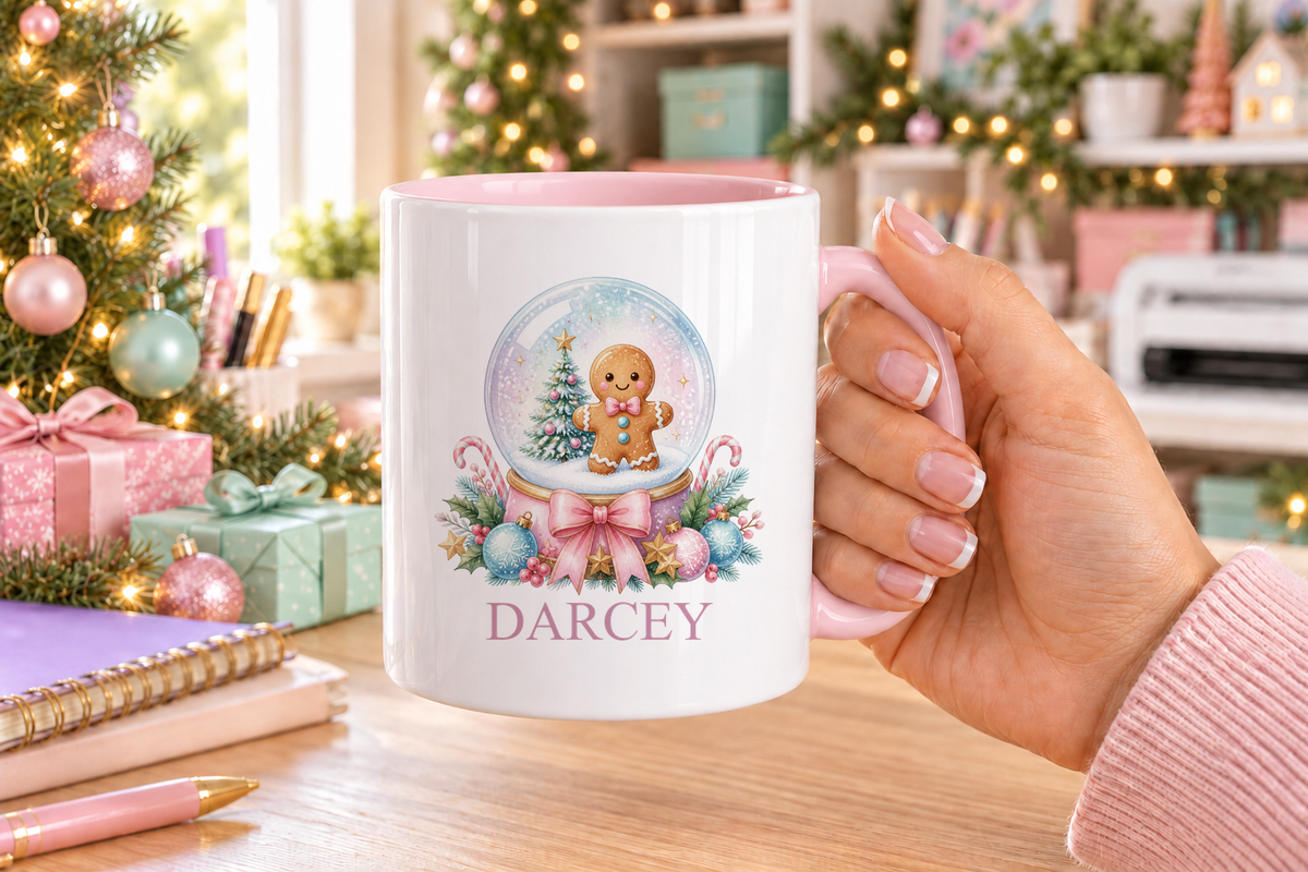 Personalised Gingerbread Snow Globe Christmas mug – pink handle with a custom name