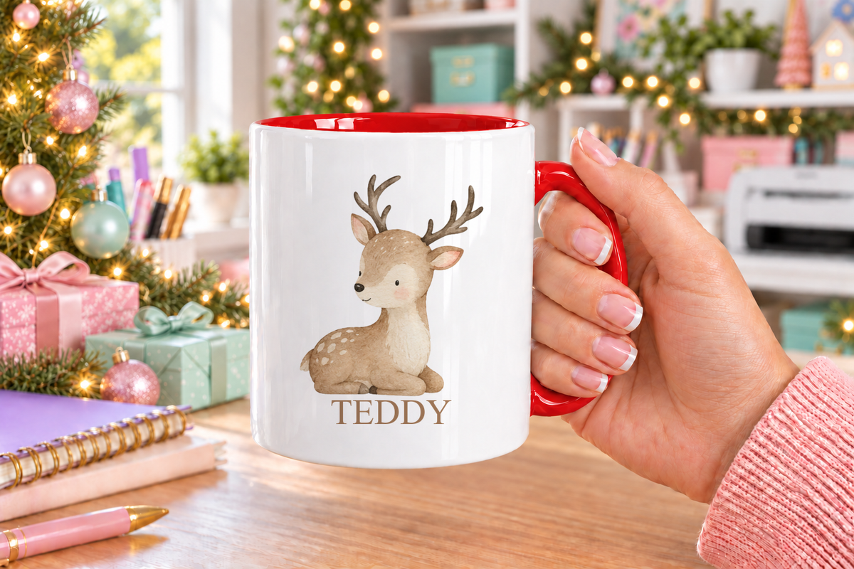 Personalised Baby Reindeer Christmas mug – red handle with a custom name