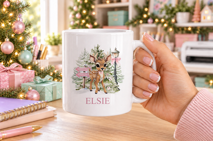 Personalised North Pole Fawn Pink Bow Christmas mug – white mug with a custom name