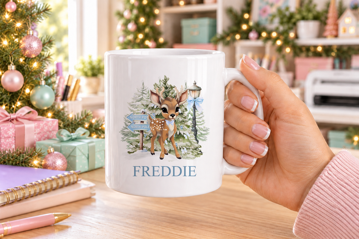 Personalised North Pole Fawn Blue Bow Christmas mug – white mug with a custom name
