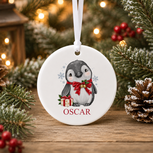 Personalised Jingle Bell Penguin Christmas bauble with a custom name