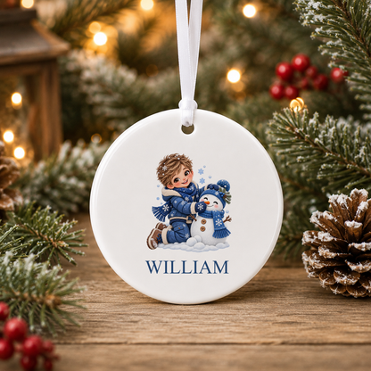 Personalised Boy Building Snowman Christmas bauble with a custom name