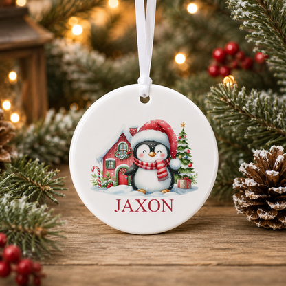 Personalised Santa Hat Penguin Christmas bauble with a custom name