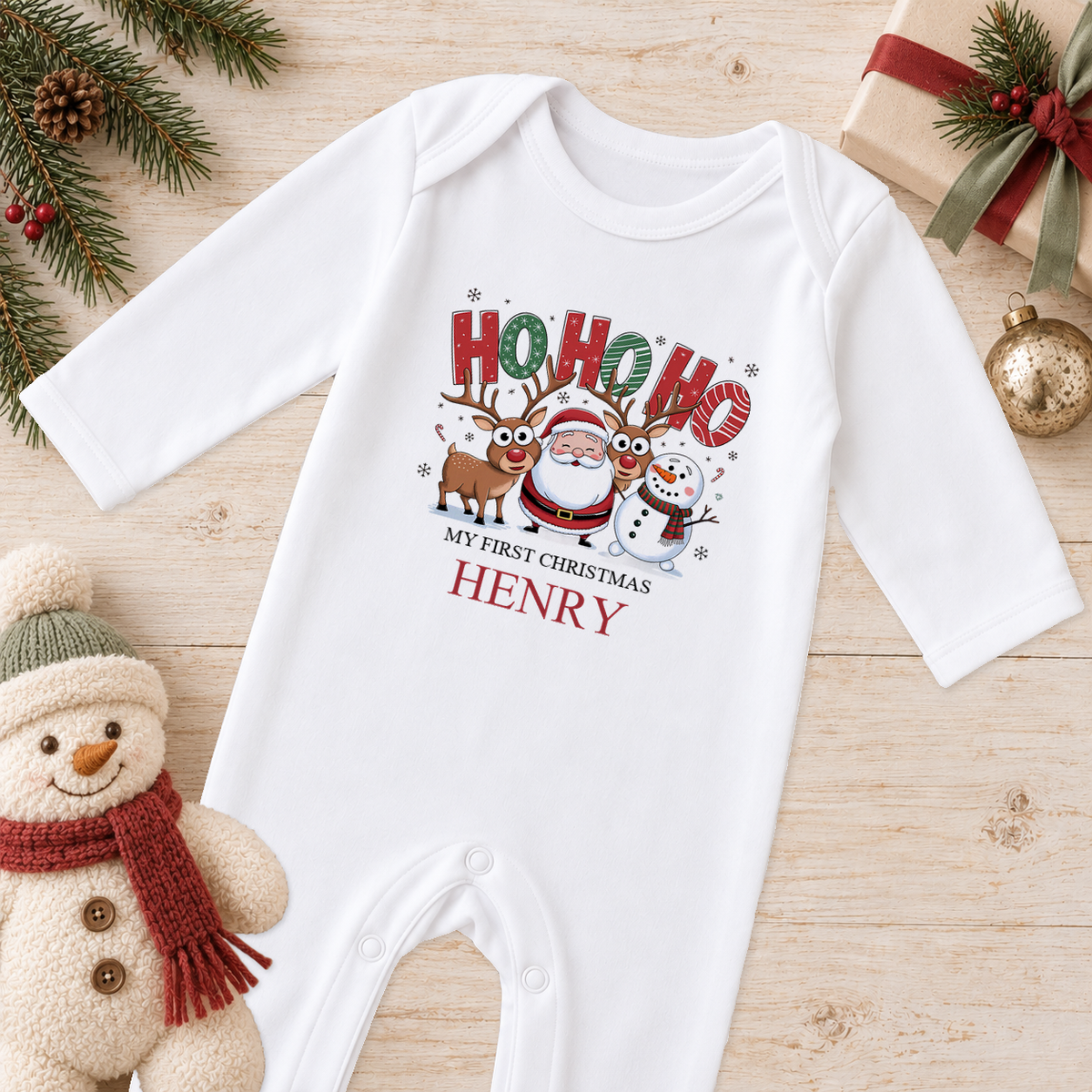 Personalised Ho Ho Ho baby Christmas sleepsuit with a custom name