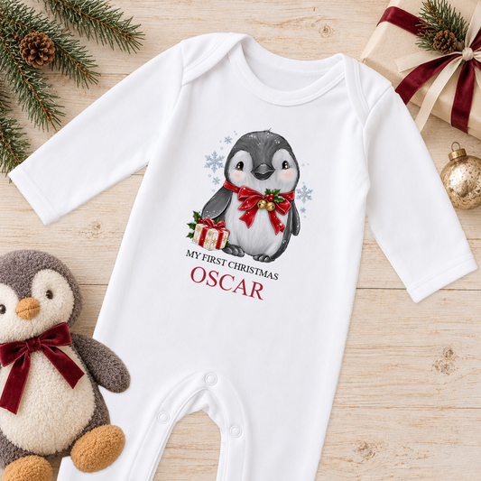 Personalised Jingle Bell Penguin baby Christmas sleepsuit with a custom name