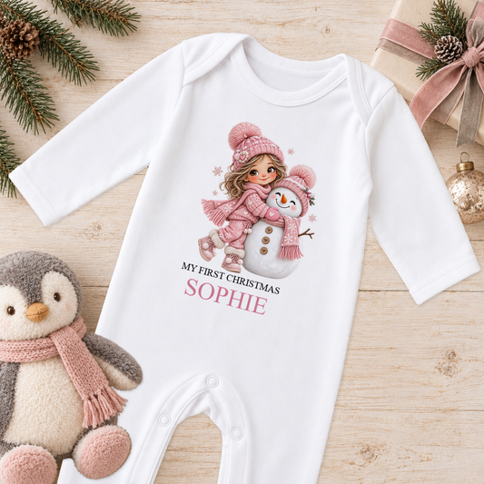 Personalised Brunette Girl and Snowman baby Christmas sleepsuit with a custom name