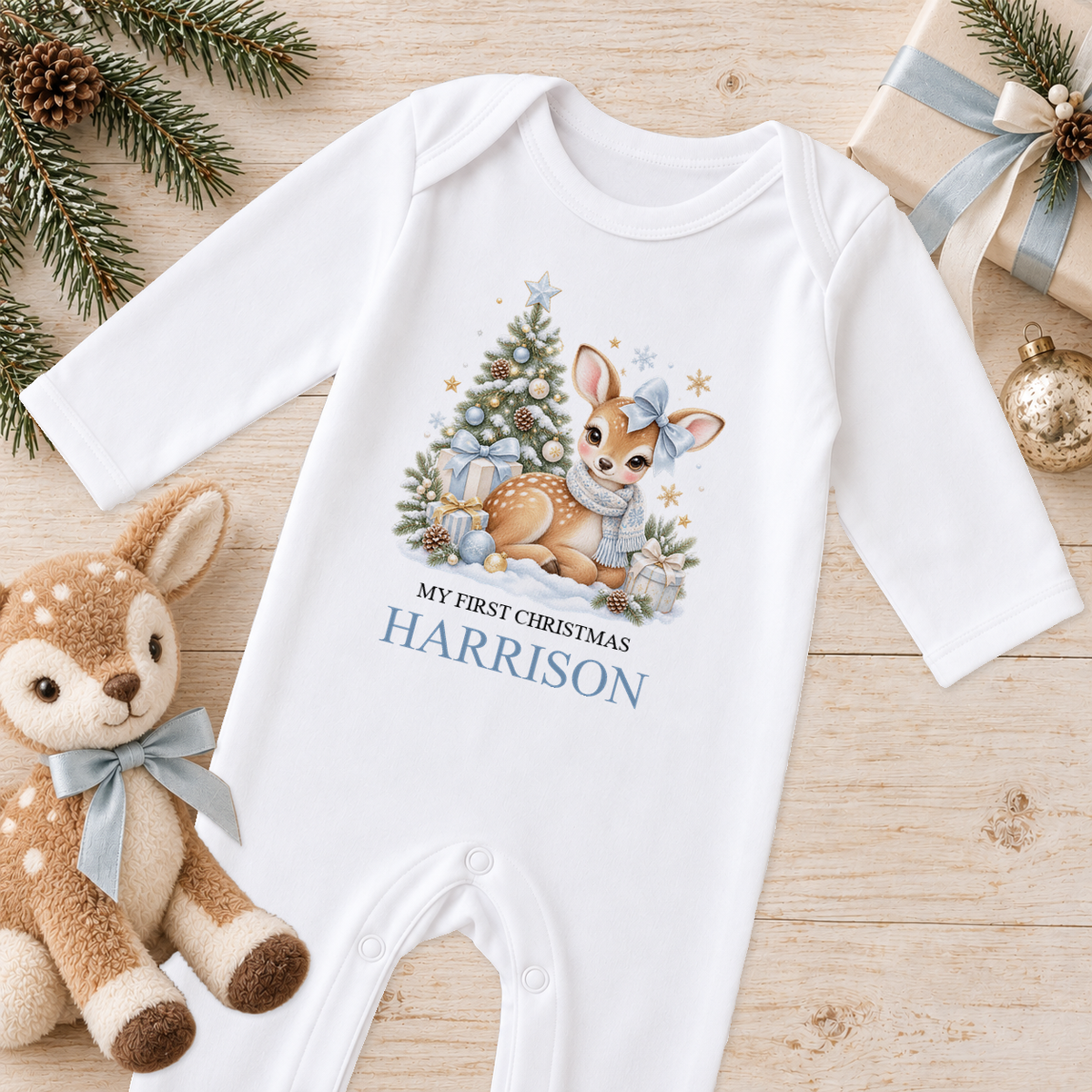 Personalised Blue Bow Fawn baby Christmas sleepsuit with a custom name