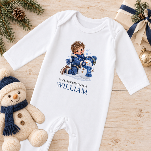 Personalised Boy Building Snowman baby Christmas sleepsuit with a custom name