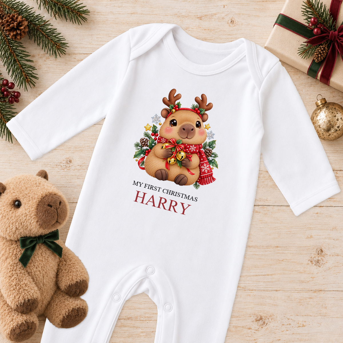 Personalised Capybara Reindeer baby Christmas sleepsuit with a custom name