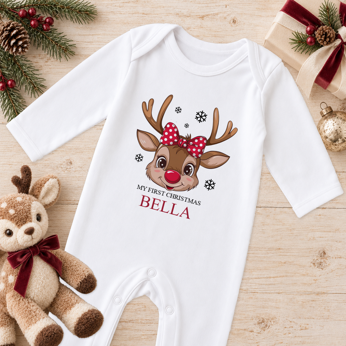 Personalised Reindeer Face Polka Bow baby Christmas sleepsuit with a custom name