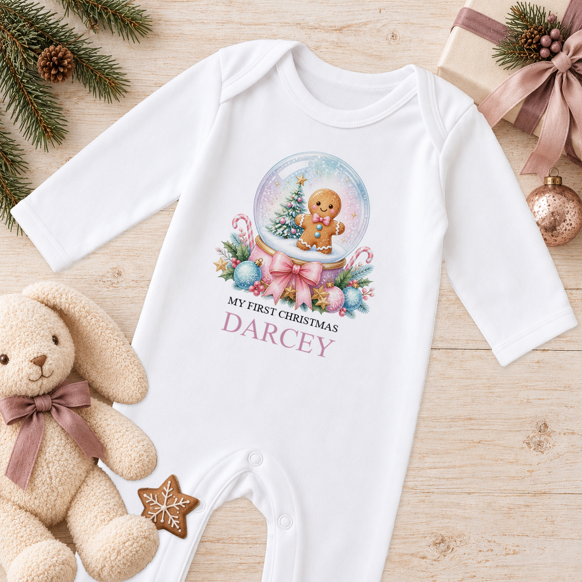 Personalised Gingerbread Snow Globe baby Christmas sleepsuit with a custom name