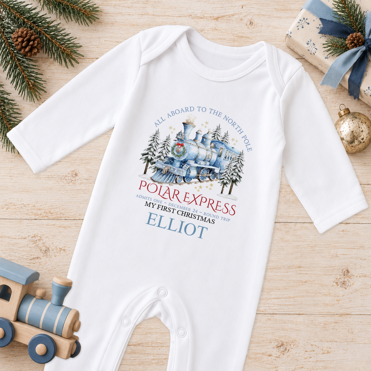 Personalised All Aboard North Pole Train Blue baby Christmas sleepsuit with a custom name