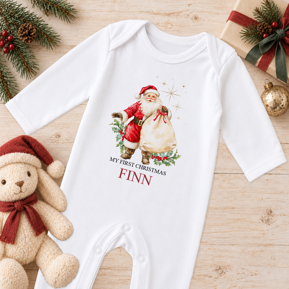 Personalised Vintage Father Christmas baby Christmas sleepsuit with a custom name