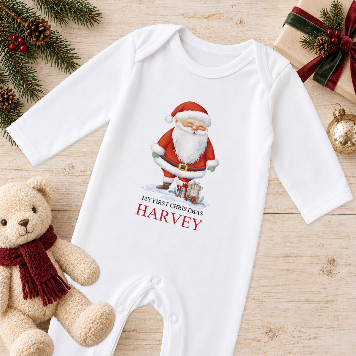 Personalised Santa with Gifts baby Christmas sleepsuit with a custom name