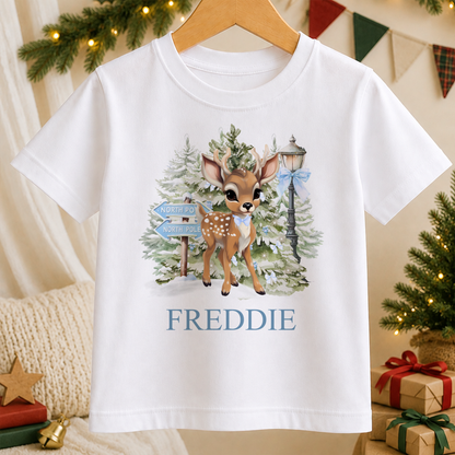 Personalised North Pole Fawn Blue Bow kids Christmas t-shirt in white with a custom name