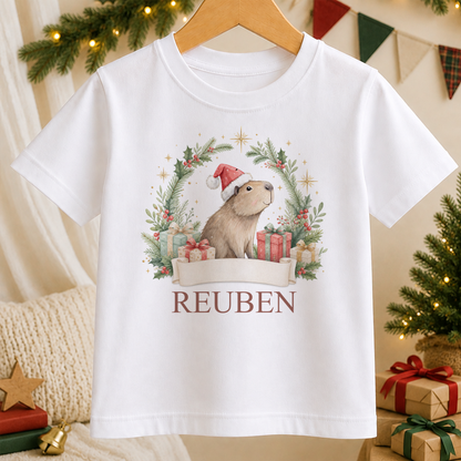 Personalised Capybara Santa Wreath kids Christmas t-shirt in white with a custom name
