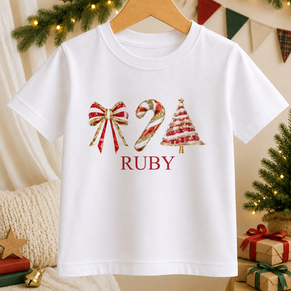 Personalised Bow, Candy Cane and Tree kids Christmas t-shirt in white with a custom name