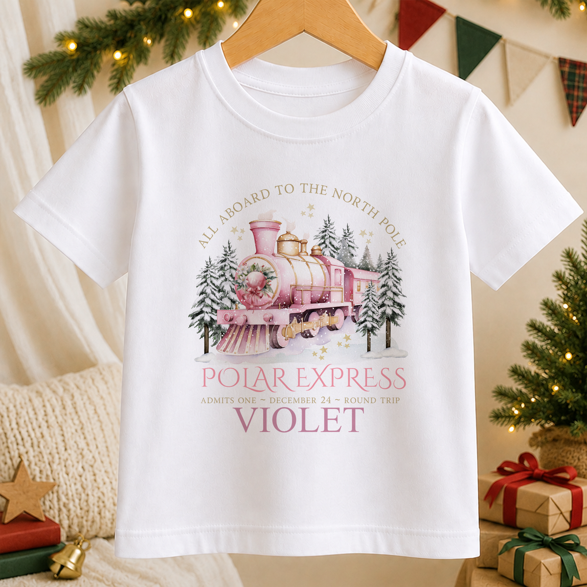 Personalised All Aboard North Pole Train Pink kids Christmas t-shirt in white with a custom name