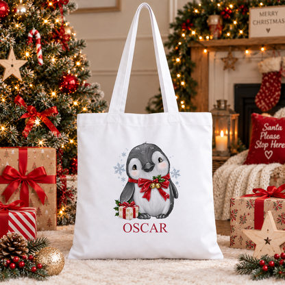 Personalised Jingle Bell Penguin Christmas tote bag with a custom name
