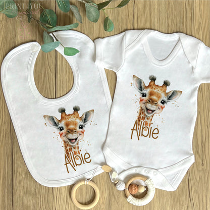 Close-up of the safari giraffe design and personalised name print on soft white cotton.