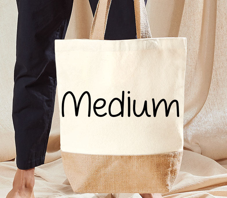 Cream and jute tote bag standing upright, labelled 'medium' to show size.