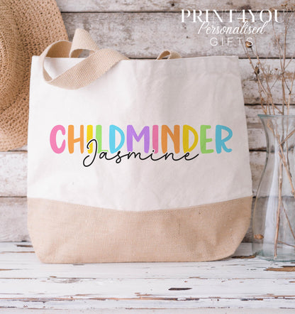 Cream and natural jute tote bag printed with colourful 'Childminder' lettering and the personalised name Jasmine, medium size.