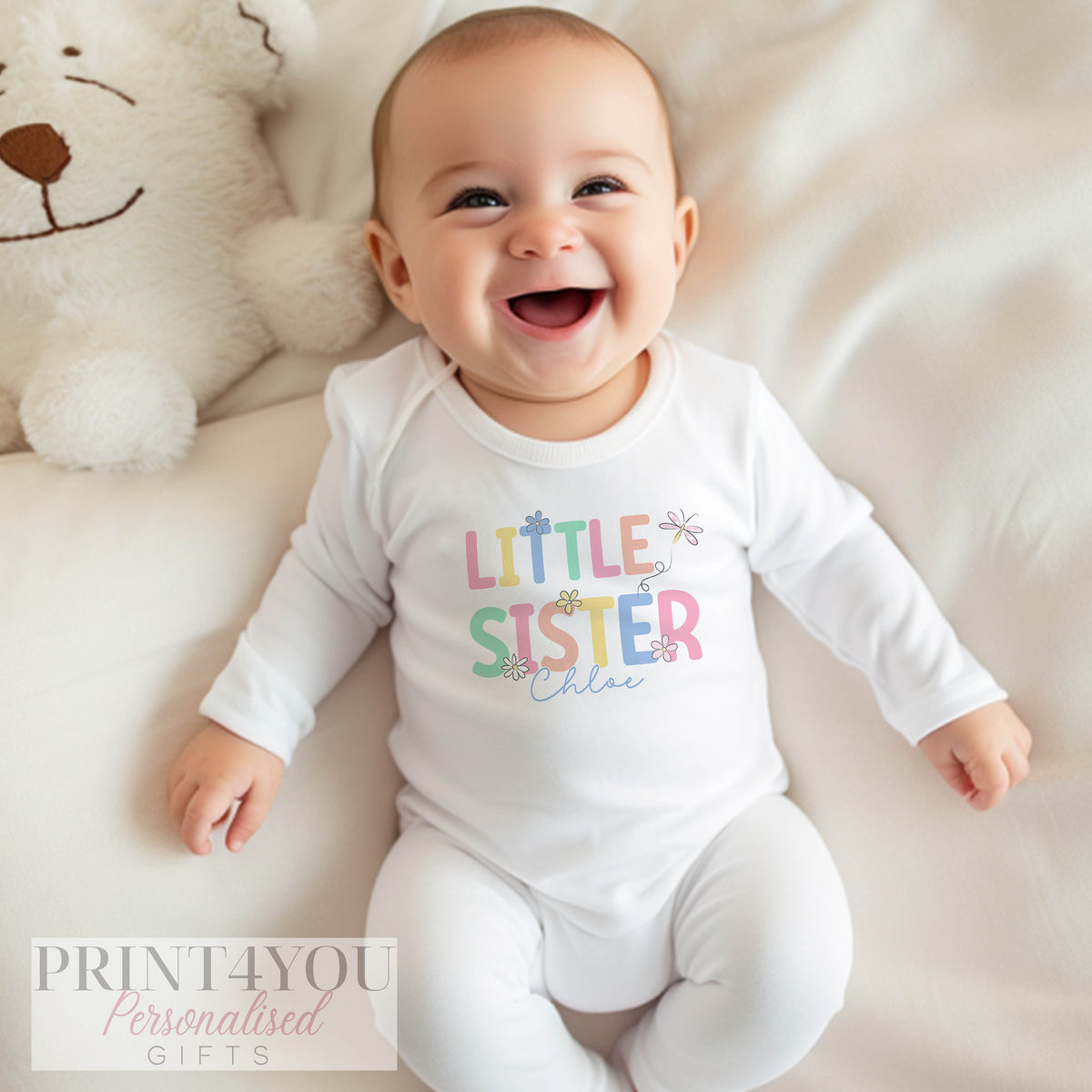 Personalised 'Little Sister' t-shirt for an older girl, part of a matching new baby sibling set.