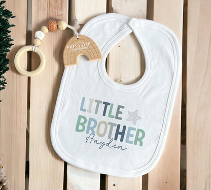 Personalised 'Little Brother' t-shirt for an older sibling, part of a matching sibling photo set.